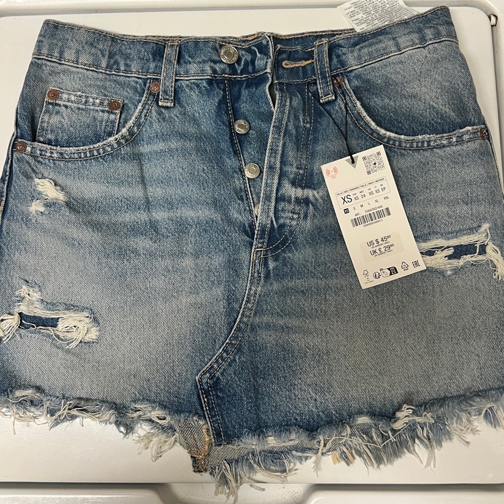 Zara distressed denim mini skirt